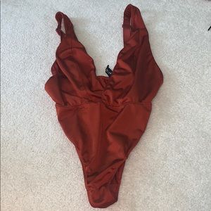 Urban Outfitters Burnt Orange Body Suit